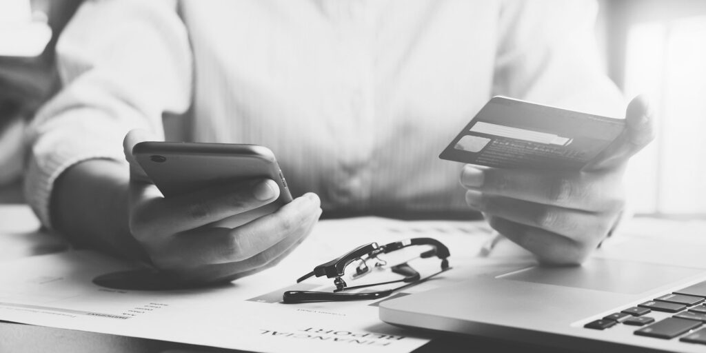 Man with credit card - Sansiveri Forensic Accounting Accounting Firm Forensic Specialist Tax Planning Financial Experts Accounting